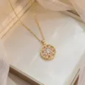 Elegante vergoldete, drehbare Sonnenblumen-Halskette mit funkelndem Zirkonia-Inlay - Drehbarer Sonnenblumen-Stil (X0592)
