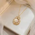 Elegant floral pearl pendant necklace in polished gold finish with sparkling zircons - Hollow Floral Wrapped Artificial Pearl Style(X0798)