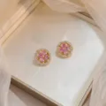 Elegant pink zircon flower stud earrings with gold finish and crystal halo - Bauhinia Rotating Earrings (E0005) / Gold Pink