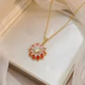 Elegant gold-plated flower pendant necklace featuring red petals and micro-pave zircons - Red and White Double Petal Necklace (X0324)