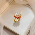 Elegant gold plated flower ring featuring sparkling zircons and red enamel petals - Marquise Zircon Red Petal Flower Ring (J0399)