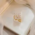 Elegant rotating Bauhinia zircon flower ring with gold plating for women's fashion - Bauhinia Rotating Ring (J0219) / Gold White