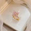 Elegant rotating pink Bauhinia flower ring with sparkling zircon in gold finish - Bauhinia Rotating Ring (J0219) / Gold Pink
