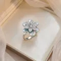 Elegant silver-plated flower ring with micro-pave zirconia and teal marbled petals - Blue Marble Petal Ring (J0797)