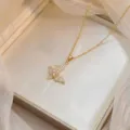 Rotating bauhinia flower butterfly pendant necklace with zircon in gold finish titanium steel - Butterfly Rotating Necklace (X0757) / Gold