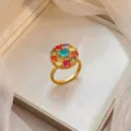 Elegant gold plated flower ring featuring vibrant multi-colored micro-set cubic zirconia - Colorful Zirconia Flower Ring - Gold (J1215-金)