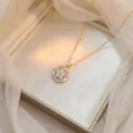 Rotating titanium steel bauhinia flower necklace with sparkling cubic zircon stones - Zirconia Rotating Flower Necklace (X0760) / Gold