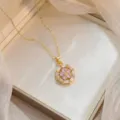 Elegant gold-plated titanium steel necklace with a rotating pink zircon flower pendant - Pink Zirconia Octagonal Rotating Necklace (X1764) / Gold