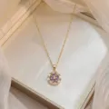 Elegant gold titanium steel necklace with a rotating purple zirconia flower pendant - Purple Zirconia Round Rotating Necklace (X1585) / Gold