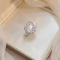 Elegant silver Bauhinia flower ring featuring a cat's eye stone and sparkling cubic zirconia - Bauhinia Rotating Ring (J0368) / Silver