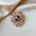 Luxury elegant floral brooch with red crystal and purple rhinestones on golden satin background - Radiant Starburst Floral Style (916) / Red (916#)