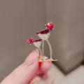 Close-up of elegant gold wine glass brooch with sparkling red gemstones and crystals - Wine Glass Shape (53)