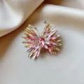 Elegant pink butterfly crystal brooch, detailed close-up view of shiny sparkling alloy pins. - Butterfly