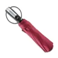 Foldable compact umbrella in wine red, portable design with convenient automatic handle. - Burgundy