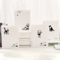 Minimalistisches A5-Loseblatt-Notizbuch-Set mit süßen schwarz-weißen Katzenmotiven - A5 Ordner (48 Blatt Liniert)