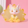 Detailed macro shot of a cute pearlescent nine-tailed fox resin figure ornament - Shanhai Fox Style C Yellow