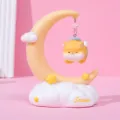 Detail of a cute shiba inu figurine hanging from a crescent moon fairy tale night light - Star Lamp / Flying Shiba (Moon Fairy Tale B)