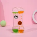 Reloj de arena líquido creativo en forma de hueso con motivos de fútbol y básquet. - Forma de Hueso (Estampado Fútbol/Baloncesto) / Bicolor naranja verde