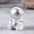 Kreative nordische Astronauten-Figur mit silbernem Stern aus Harz als Tischdekoration - Mini-Astronaut Hält Stern