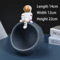Figura decorativa de astronauta nórdico sentado en un cuenco de almacenamiento lunar - Astronauta de Almacenamiento Luna (Azul)