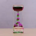Reloj de arena líquido decorativo bicolor con gotas de aceite verdes y púrpuras - Rosa y Verde