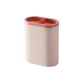 Double-compartment oval pen holder for desk organization, plastic student stationery storage box. - Light Pink