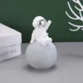 White resin astronaut sitting on a cratered moon lamp ornament for bedroom decor - Romantic Planet Style A (52-1) / Small-Medium