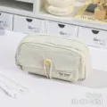 Μεγάλη μολυβοθήκη από καμβά σε κρεμ-λευκό χρώμα με κλείσιμο με κουμπί για σχολείο - Ζαχαρί