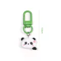 Cute cartoon panda keychain with green lobster clasp, stylish backpack pendant accessory. - Cute Girl
