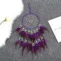 Attrape-reves violet mural avec plumes et perles en bois pour la decoration interieure. - 20cm / Violet