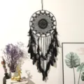 Large black feather dream catcher wall hanging decor detail view for home bedroom living room. - L Black