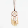 Detail view of ethnic dreamcatcher necklace featuring colorful beads and natural feathers - Khaki