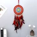 Grand attrape-rêves coloré fait main avec des plumes rouges pour décoration murale bohème - Rouge