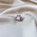 Close-up of a vintage Chinese style purple enamel flower brooch with a pearl center on silk - New Chinese Enamel Floral Style (913) / Diameter approx. 2.5cm / Purple (913#)