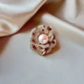 Elegant floral brooch featuring red rhinestones and a large pearl on satin background - Luxury Artificial Pearl Camellia Style (915) / White (915#)