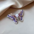 Elegant butterfly brooch featuring a large center pearl and purple enamel wings - 878# Purple Butterfly (Brooch 878) / Purple Butterfly
