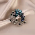 Elegant blue and teal crystal wreath brooch pin for women suit accessories and lapels - Fern Leaf