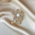 Elegant gold flower brooch featuring sparkling rhinestones and a central white pearl inlay - Five-Petal Flower Style (834) / Artificial Pearl Flower