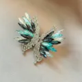 Elegant butterfly brooch pin with teal and iridescent crystals for women suit accessories - Green Butterfly