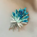 Elegant leaf-shaped brooch pin with vibrant blue and white crystals for women fashion - 1006