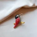 Elegant colorful bird brooch pin with red and green rhinestones on soft silk background - Red Sparrow Style (836) / Red Sparrow