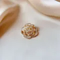 Elegant gold rose-shaped brooch encrusted with sparkling crystals on satin fabric - Rose Flower Style (894) / Gold With White Rhinestone