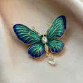 Detailed view of an elegant green and blue butterfly brooch with crystal accents. - 936# Green Butterfly