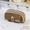 Grote bruine canvas etui met dubbele ritssluiting en knoopsluiting - Bruin