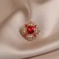 Vintage red crystal brooch ornate gold tone metal rhinestone lapel pin fashion accessory - Red Flower
