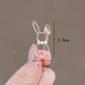 Detail of rabbit brooch with pink heart crystal and pearls showing 3.5cm x 1.5cm dimensions. - 粉色爱心兔子(72)