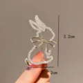 Macro detail view showing 3.2cm height of sparkling rabbit brooch with rhinestone bow - 无眼兔子(82)