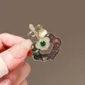 Vintage elegant instrument shaped brooch with green rhinestone and pearl for coat decor - Pearl Pipa / Gold