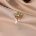 Detailed view of a vintage Chinese style ruyi lock brooch with green enamel and pearls - Chinese Style Auspicious Cloud Pendant Brooch