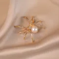 Chic gold spider brooch featuring white pearl and rhinestones for elegant women winter coat. - Gold Spider / Gold